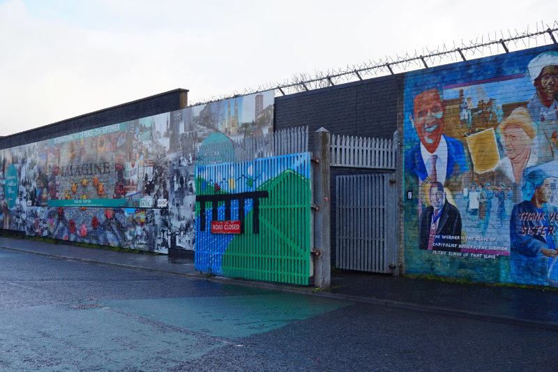 Political mural wall with the gates, Belfast, Northern Ireland
