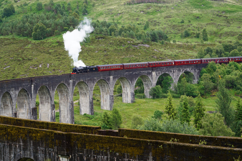 Jacobite, aka the Harry Potter train crossing the Glenfinnan viaduct in Scotland