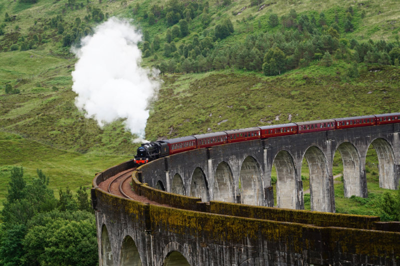 Jacobite, aka the Harry Potter train crossing the Glenfinnan viaduct in Scotland