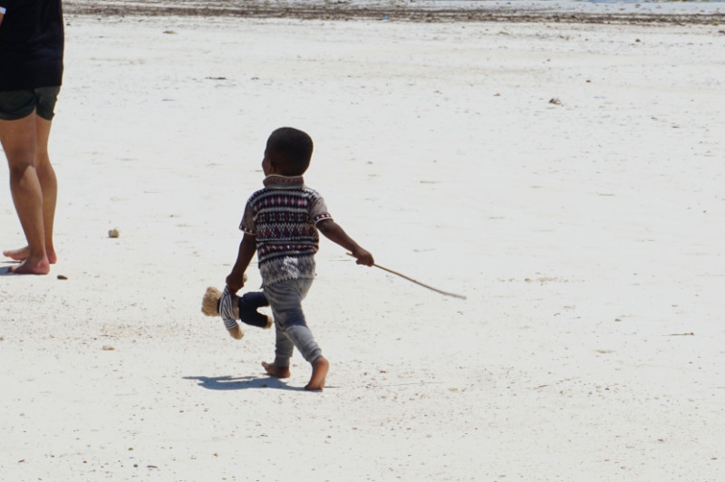 Zanzibari kid with Gulliver, Zanzibar, Tanzania