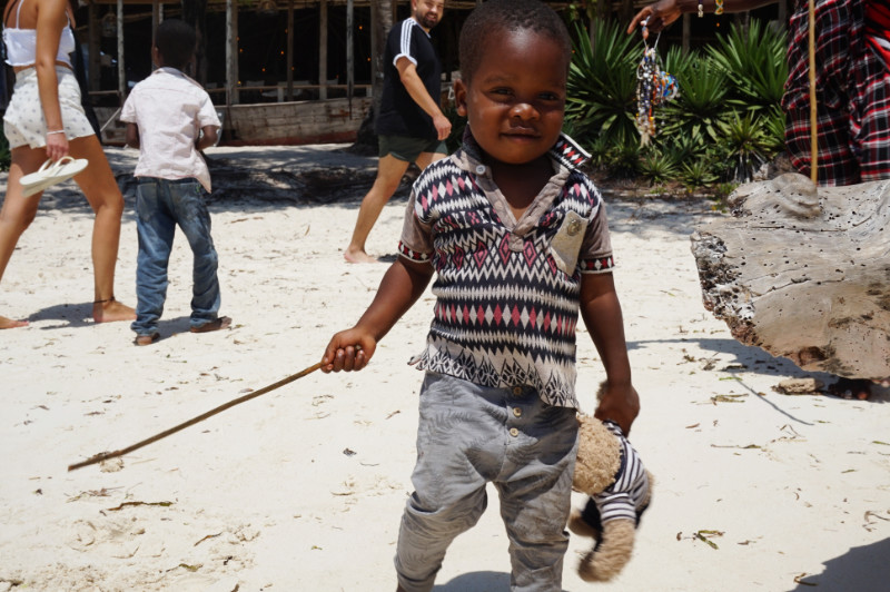 Zanzibari kid with Gulliver, Zanzibar, Tanzania