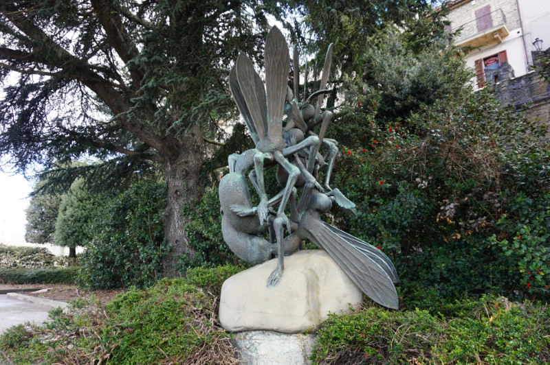Weird fly orgy statue, San Marino