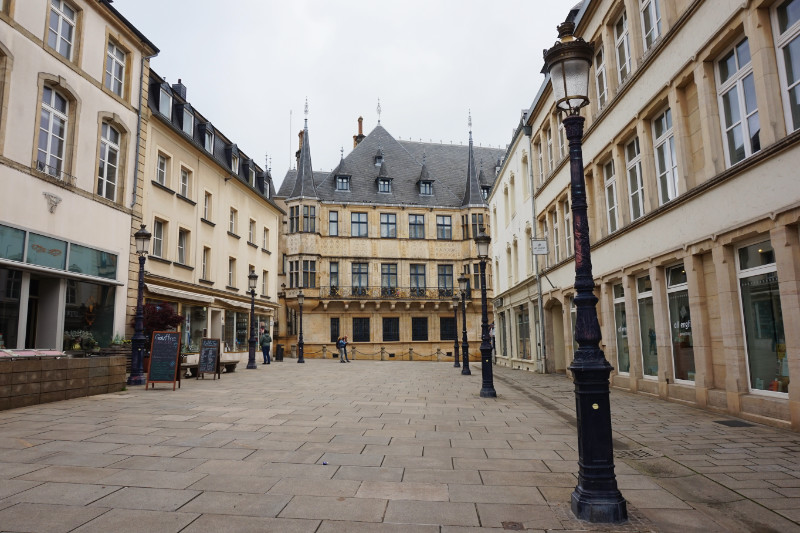 Palais Grand Ducal, Luxembourg. View from down the street, with a street lamp in the foreground.