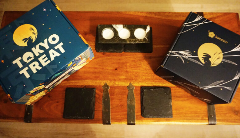 Tokyo Treat and Sakuraco subscription boxes, unopened, on our coffee table.