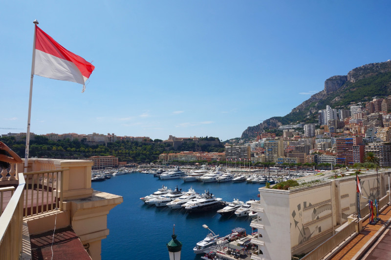Port Hercule marina with a Monaco flag flying on the left, Monaco
