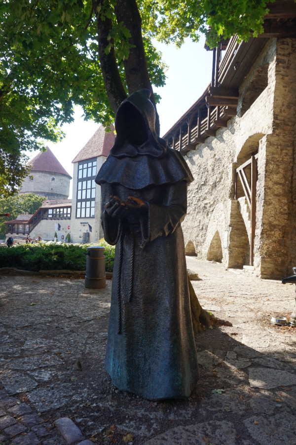 Creepy reaper statue by Kiek in de Kok, Tallinn, Estonia