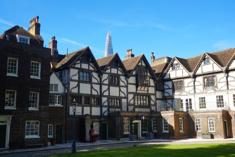 Quarters at the Tower Of London, some Tudor style houses with the Shard poking up behind
