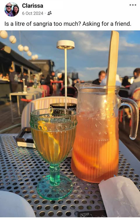 Sangria at Linea Closer To The Moon bar, Bucharest, Romania. It's a screenshot of a Facebook post that says "Is a litre of sangria too much? Asking for a friend."