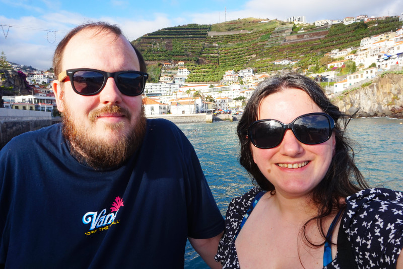 Ash & I in Camara de Lobos, Madeira, Portugal with the harbour, village and hill behind us