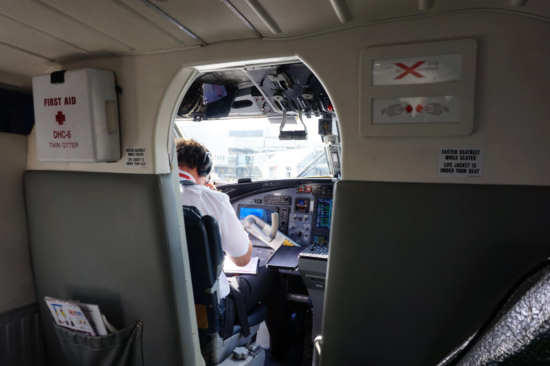 Looking into the cockpit on the Twin Otter Loganair plane to Barra, Scotland