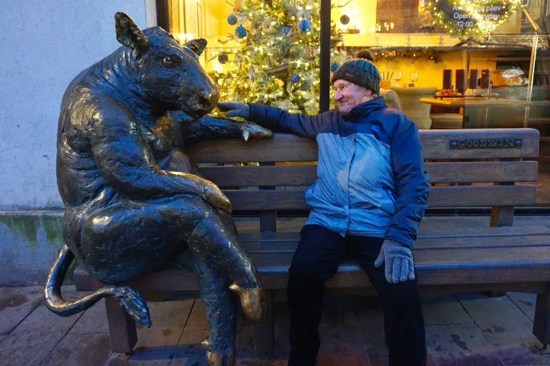 Dad with a cow outside Goodwin's restaurant, Tallinn, Estonia