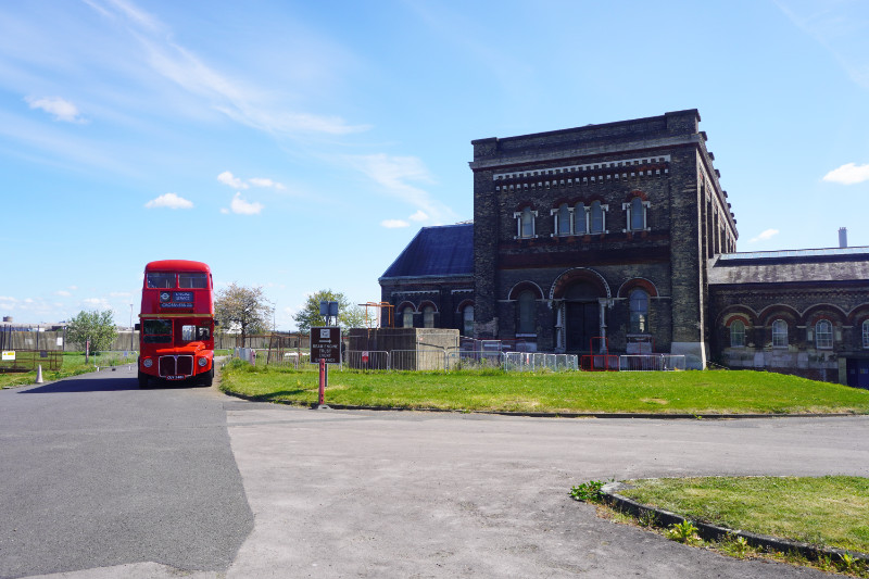 Crossness Pumping Station with a vintage double decker Routemaster bus, London